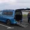 Lewis Reed Group | British Supplier of Wheelchair Accessible Vehicles | Volkswagen Caddy Maxi 5 side view with ramp down