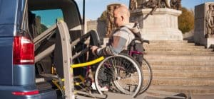 Lewis Reed Group | Wheelchair Accessible Vehicles | Man using WAV lift